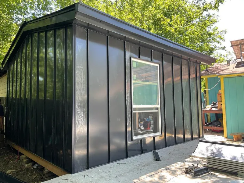 Black standing seam metal wall panels for Roof Inspection in Loxley